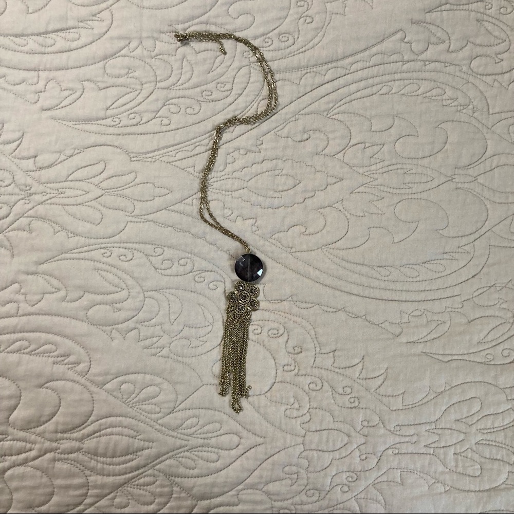 Black dangling necklace. Costume jewelry.